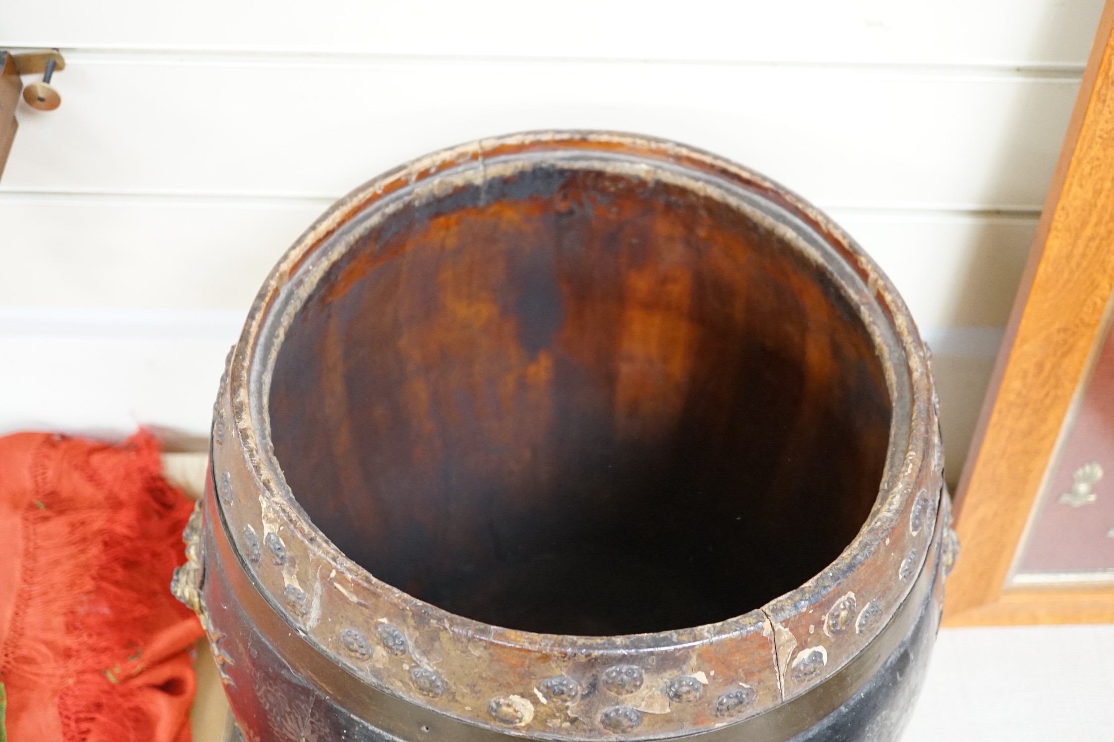 A Chinese lacquer decorated wood barrel form seat/storage container, 40cms high